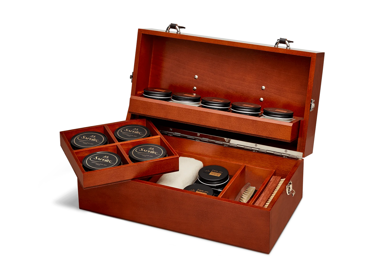 For the leather aficiando. Presented in a stunning Beechwood box. A wonderful gift or addition to the shoe arsenal. Solid beech frame made in France, with a beautiful Mahogany finish and chocolate leather trims. The Intendant Box contains the following: Included: 5 x Shoe cream jars- neutral, black, light brown, med.brow and dk. brown 4 x Tins 50ml shoe polish-neutral, black, med.brown, and dk. brown 2 x Shoe polishes brushes 18cm 2 x Small spreaders, 1 cloth, 1 shoe horn Size : 37 x 20 x 15 cm