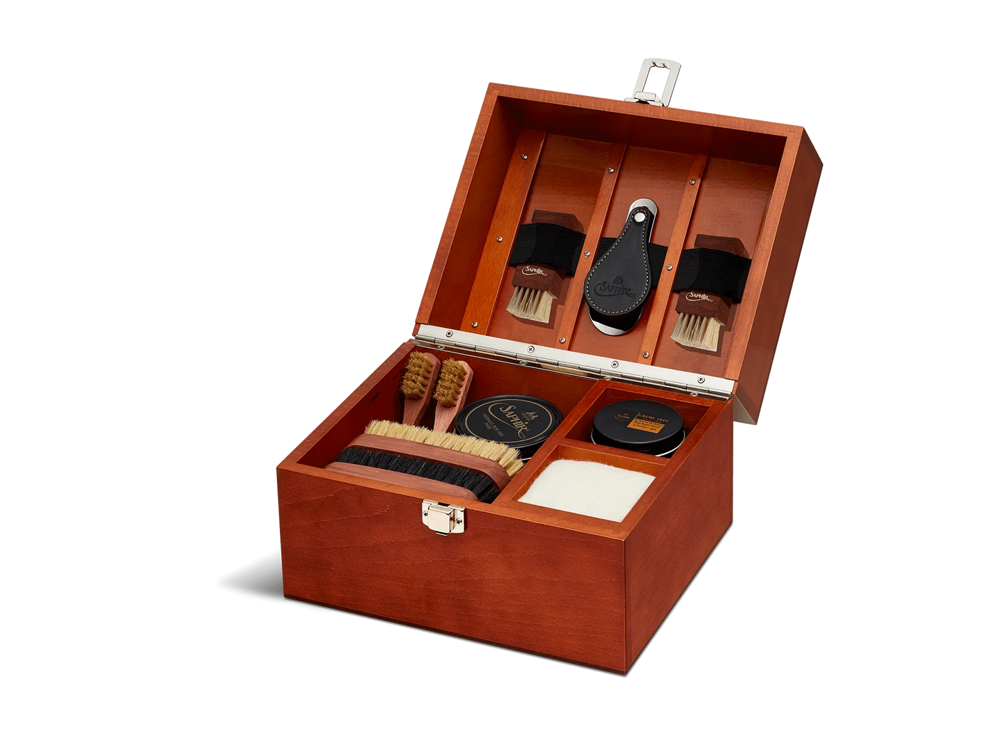 For the leather connoisseur. Presented in a stunning Beechwood box. A wonderful gift or addition to the shoe arsenal. Solid beech frame made in France, with a natural finish and vegetal leather trims. The Groom Deluxe Box contains the following: 2 x 100ml shoe polish tin (1 x black, 1 x dark brown) 1 x renovator cream 2 x Spatula brushes 2 x Shoe polisher brushes 2 x Small spreaders 1 x Polish cloth Size: 37X20X15cm