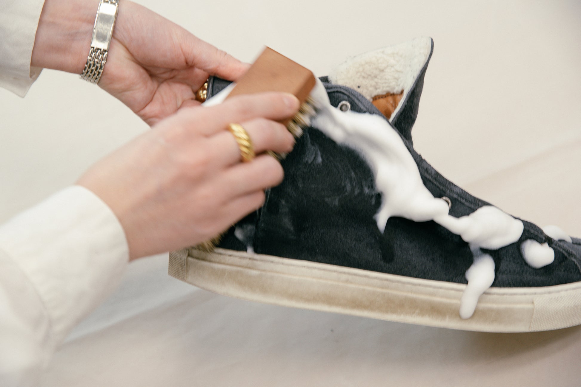 Diemme Deerskin veneto high being scrubbed down with Saphir Horse hair brush and saphir foam cleaner for sneakers
