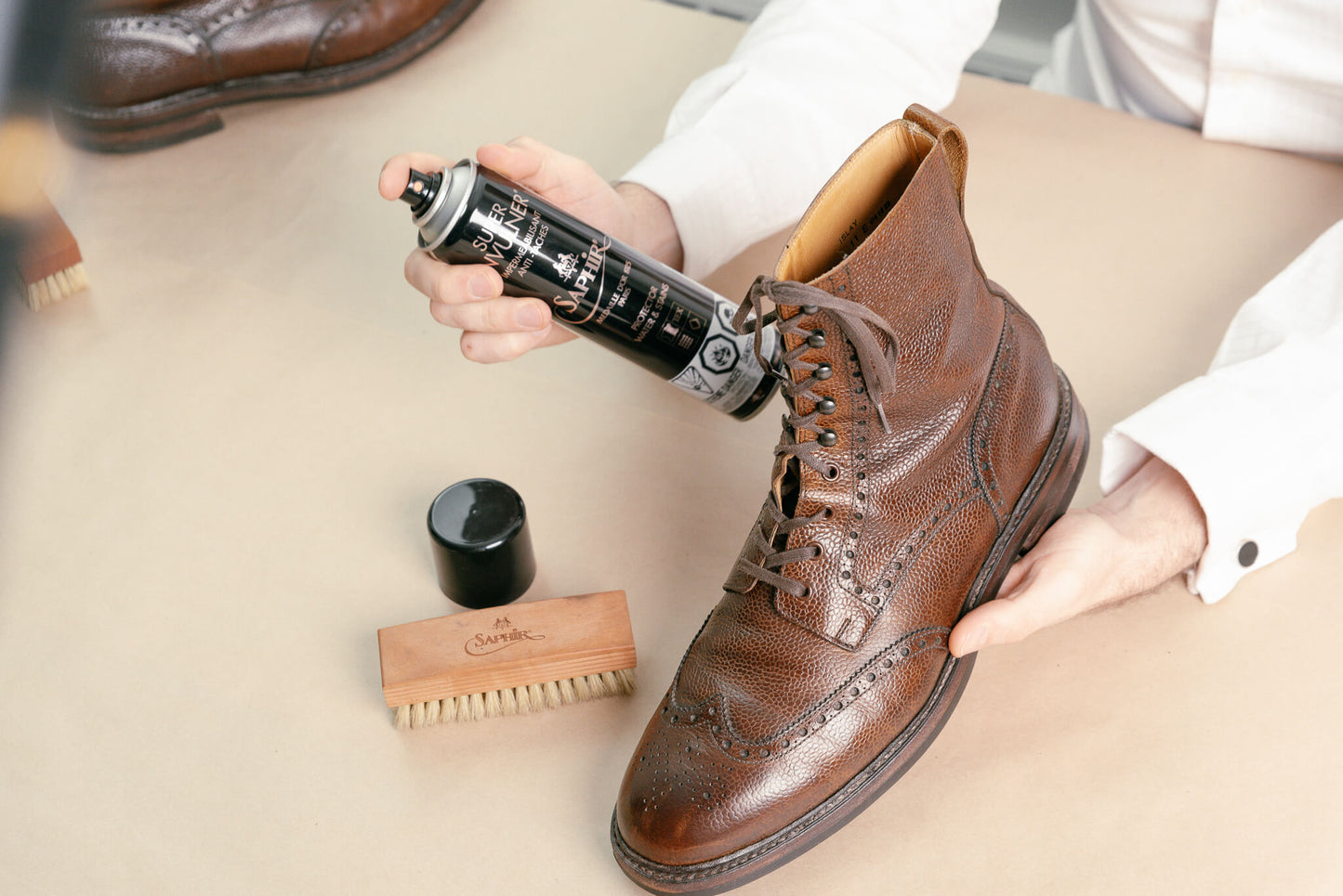Saphir Medaille d'Or 1925 Super Invulner Waterproofing Protectant Spray displayed with crockett & jones islay boots about to be sprayed - Brillare