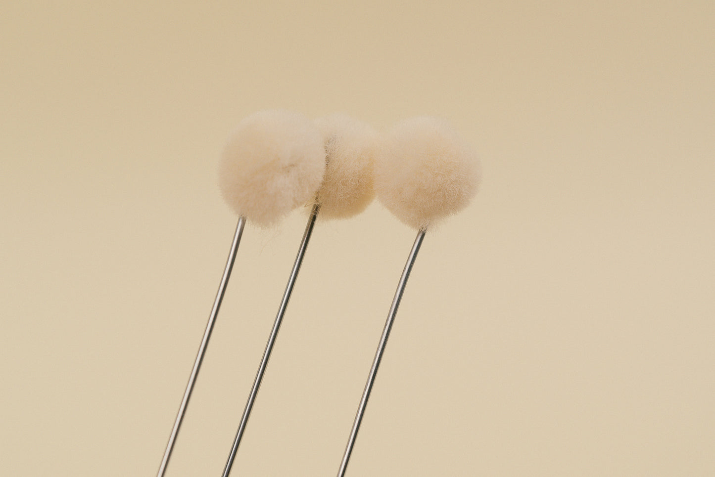 Wool Dauber with metal tip for polish application, made in USA  shown with 3