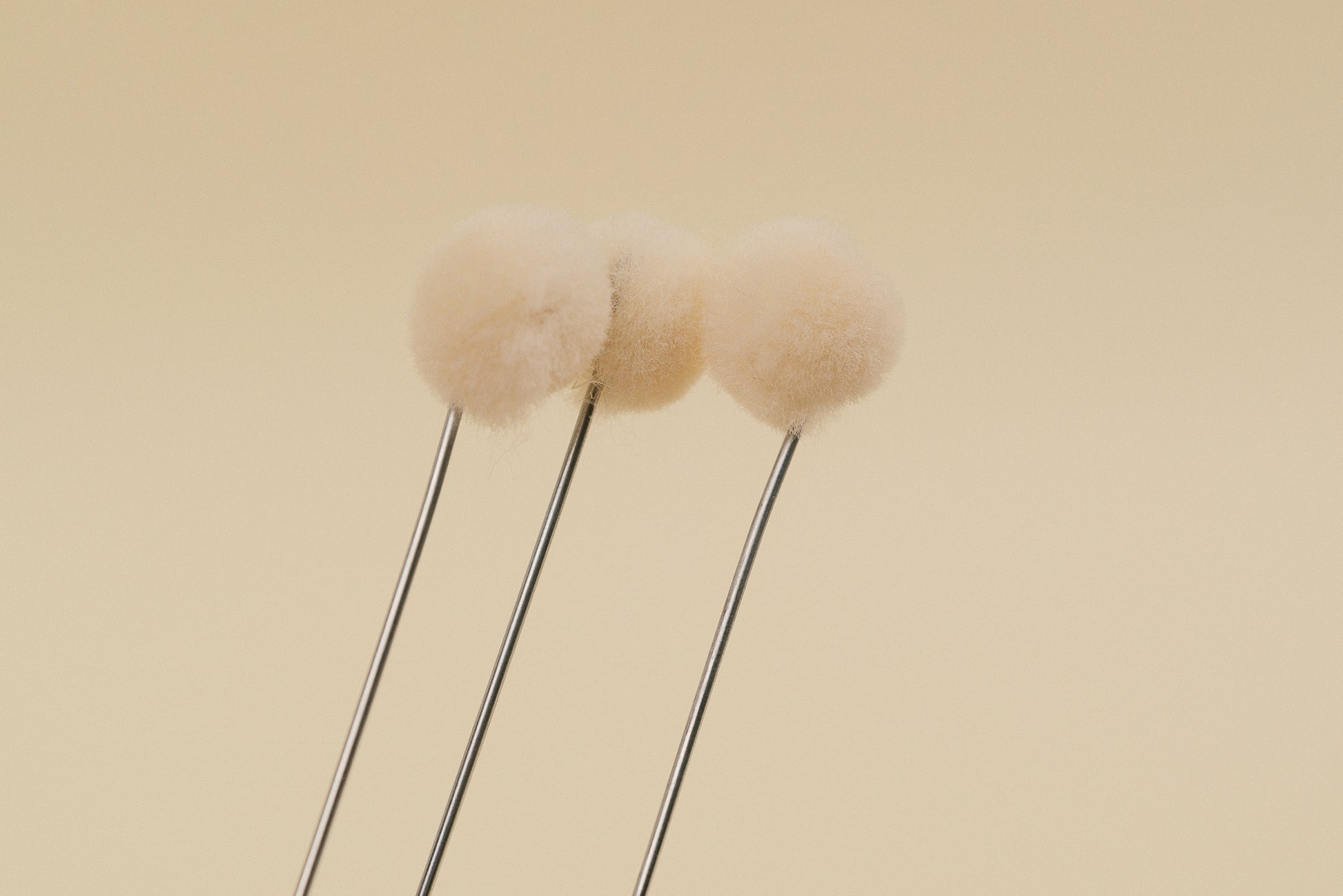 Wool Dauber with metal tip for polish application, made in USA  shown with 3