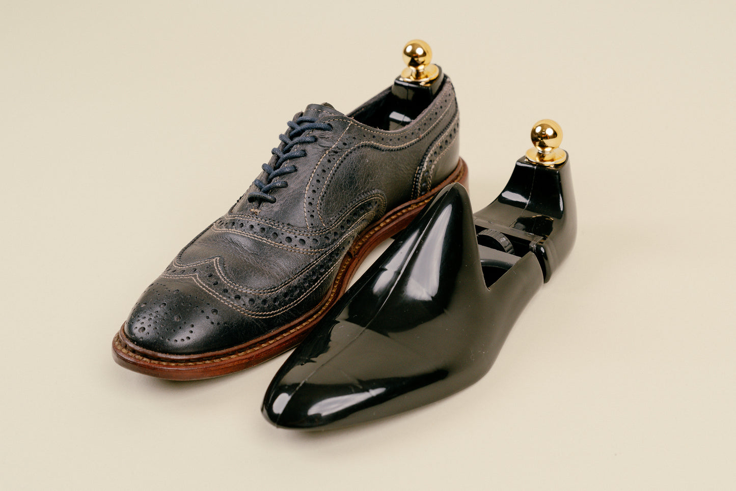 Brillaré black plastic adjustable shoe trees made in italy 7 inserted into a pair of allen edmonds oxfords