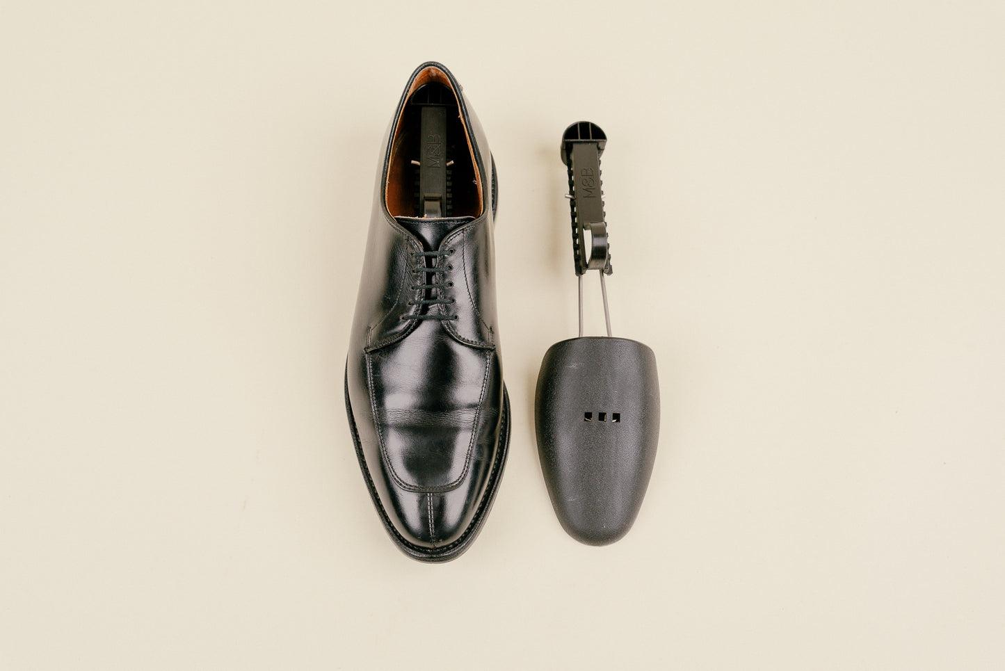Brillaré black lightweight adjustable shoe trees for sneakers or dress shoes shown in Allen Edmonds Lesalle dress shoes