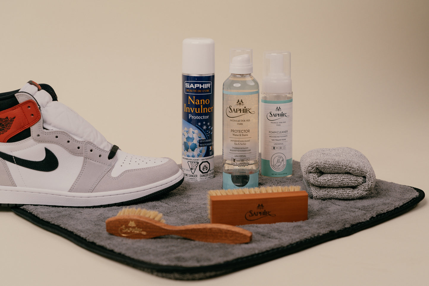 Brillaré Premium sneaker car kit. Feating Saphir Medaille d'or Horse hair spatula brush, horsehair shine brush, foam cleaner, & protectant spray. Saphir BDC Nano Invulner spray, jumbo brillare cleaning mat and brillare deluxe microfibre cloth with Nike Air Jordan Air Force 1