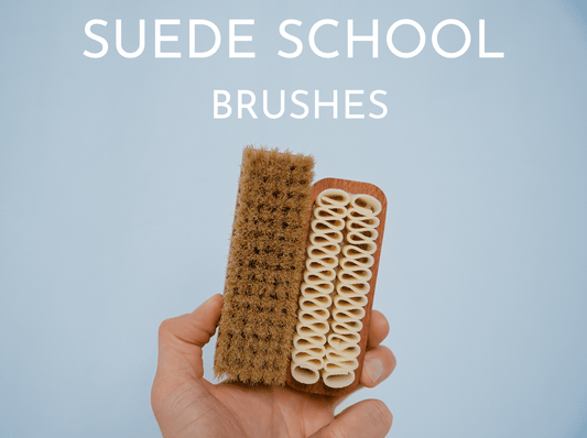 Suede School: Brushes blog photo. Saphir Medaille d'or small horse hair polish brush and Saphir Medaille d'or suede crepe brush held together on a blue background