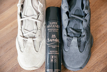 Saphir Medaille d'Or 1925 Super Invulner Waterproofing Protectant Spray displayed with suede yeezy 500 in taupe light and yeezy 500 utility black