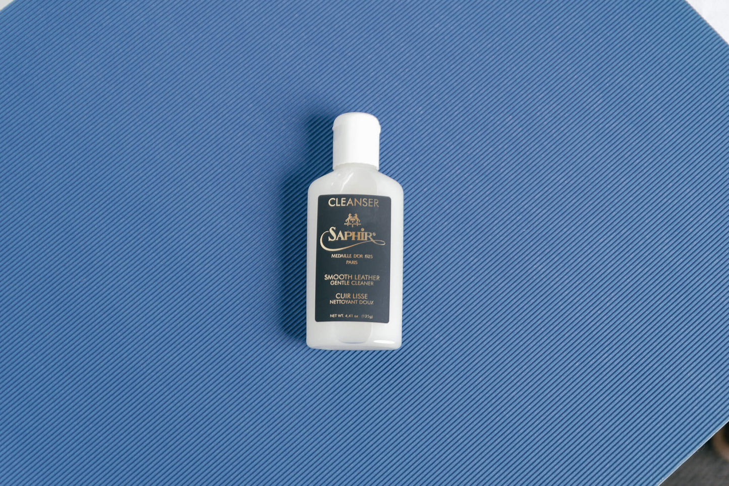 Saphir Medaille d'or Gentle Leather Cleanser - Brillare displayed on blue back drop