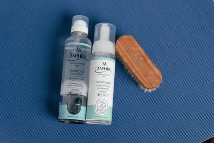 Saphir Medaille d'Or Mini Horse Hair Brush shown with Saphir Medaille d'Or Foam cleaner and Saphir medaille d'or protecter 