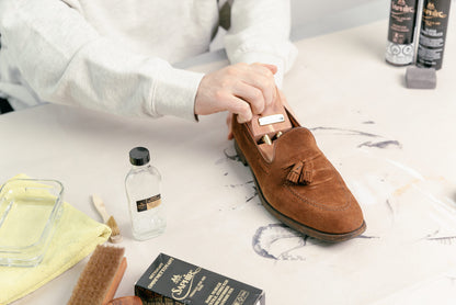 Crockett & Jones polo snuff suede cavendish loafer shown with Saphir crepe brush, omni'nettoyant suede cleaner, suede gommadin brick, and saphir MDO horsehair brush and Saphir Cedar Shoe trees with saphir invulner and saphir renovating suede spray in the background