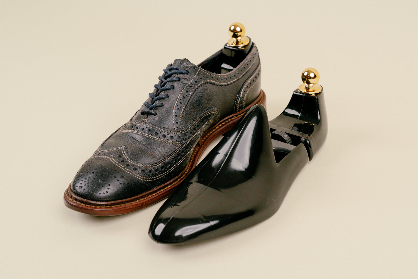 Brillaré black plastic adjustable shoe trees made in italy 7 inserted into a pair of allen edmonds oxfords 